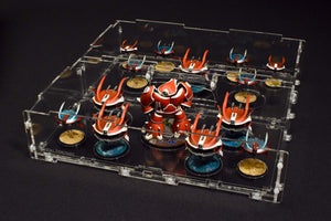 Painted miniatures in a humpback acrylic case